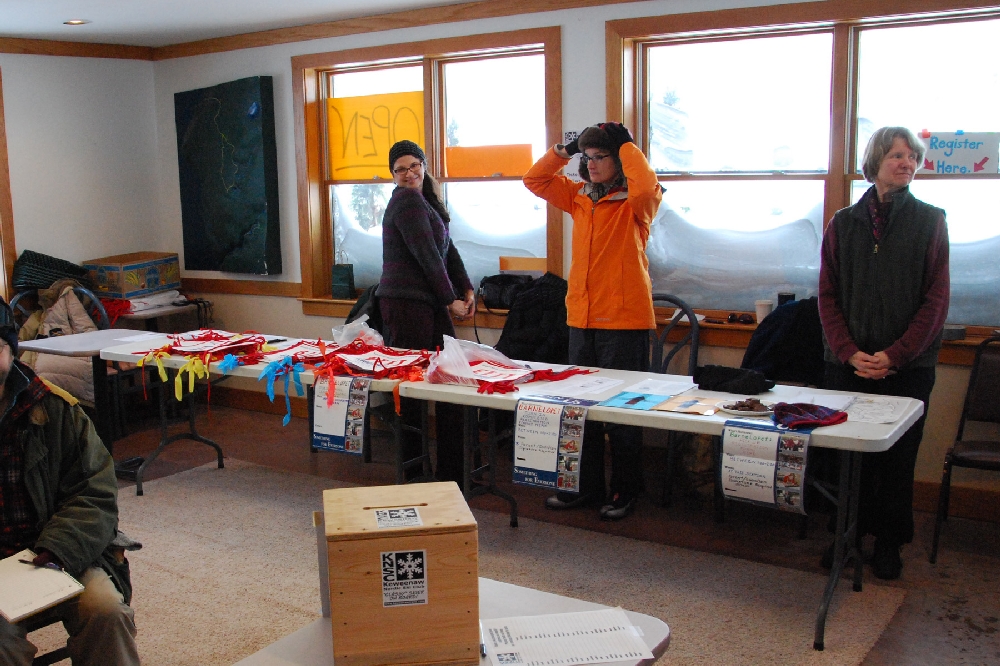 The sign up crew gets ready for the End of Race activities, after registering a good contingent of young racers, in the Mastto Hihto Trails Chalet, in Hancock
